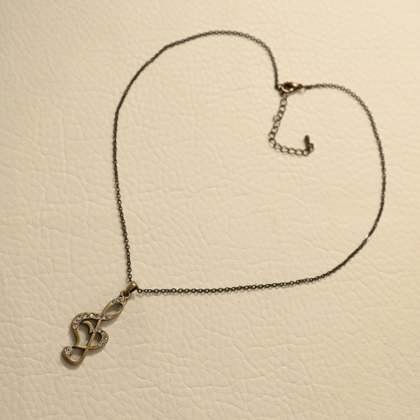 Antique Bronze Treble Clef Necklace with Engraved Coin